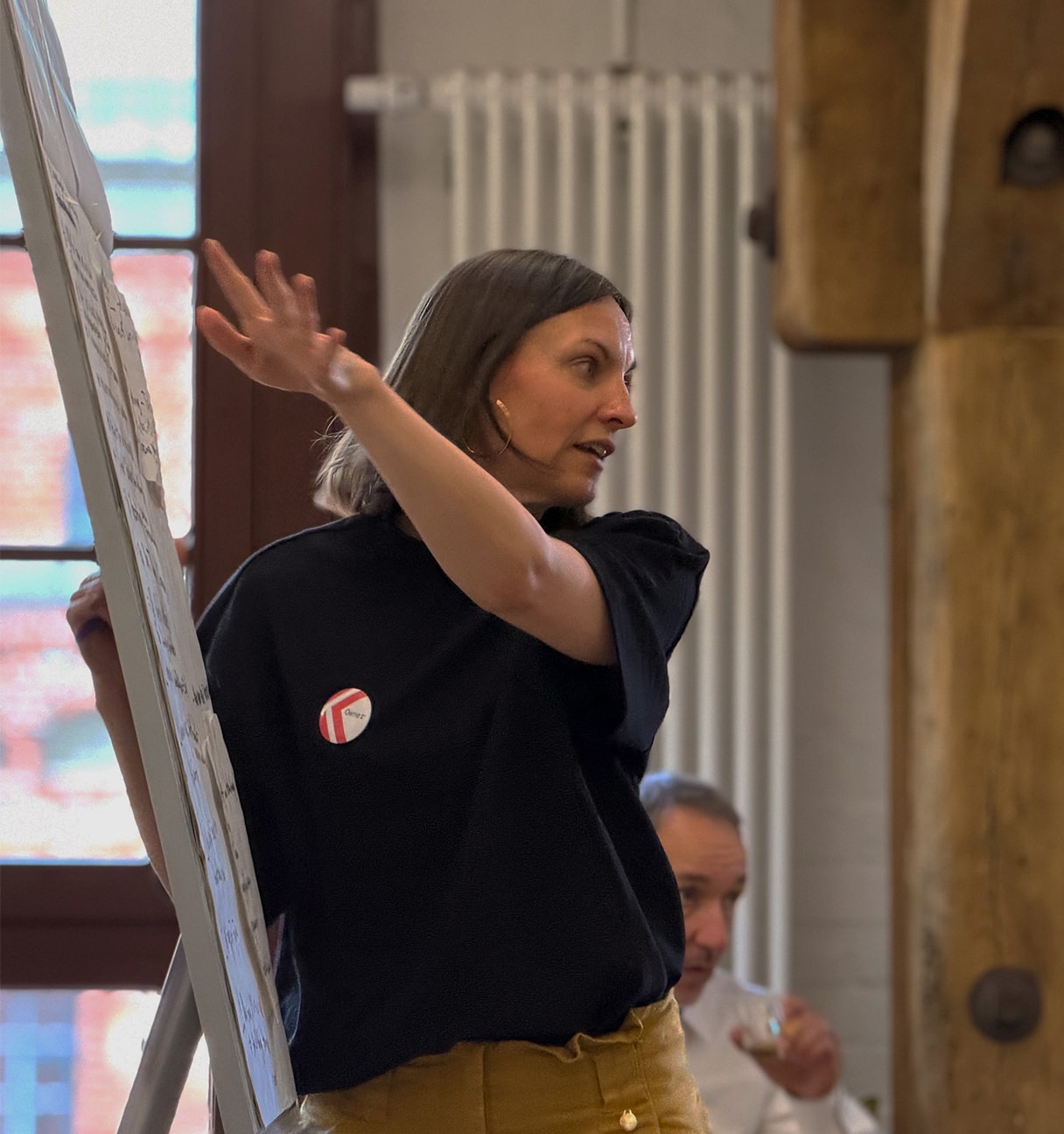 woman explaining a flipchart