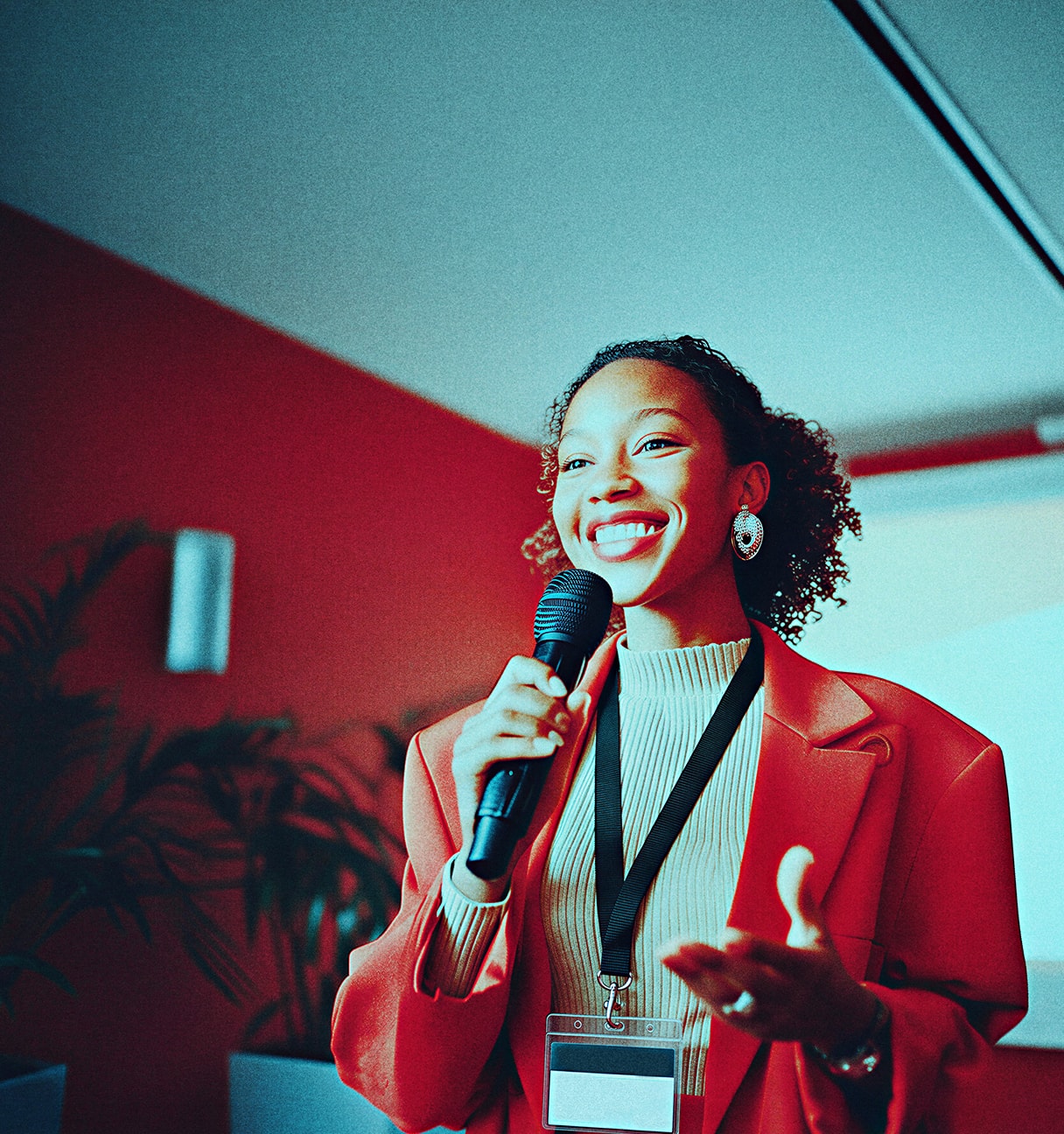 female speaker with microphone